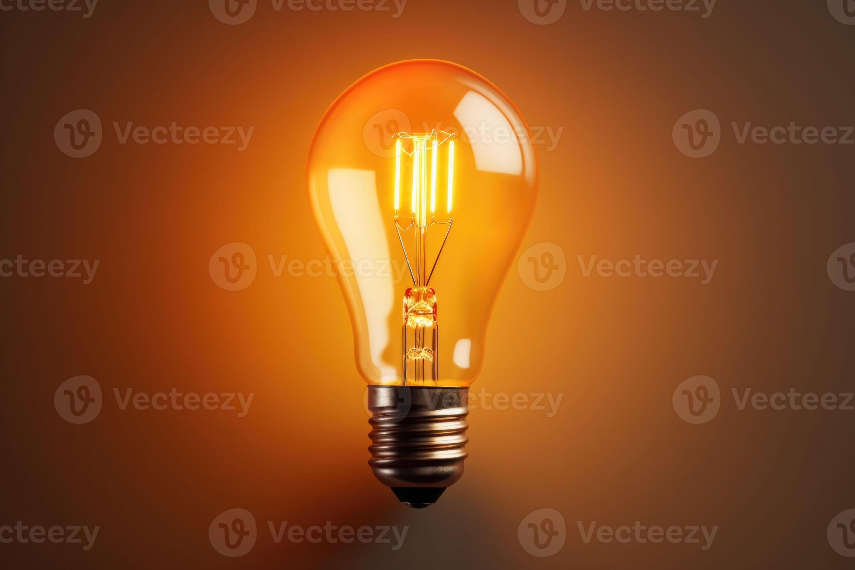 Glowing yellow light bulb. Bright light bulb illustrating the idea