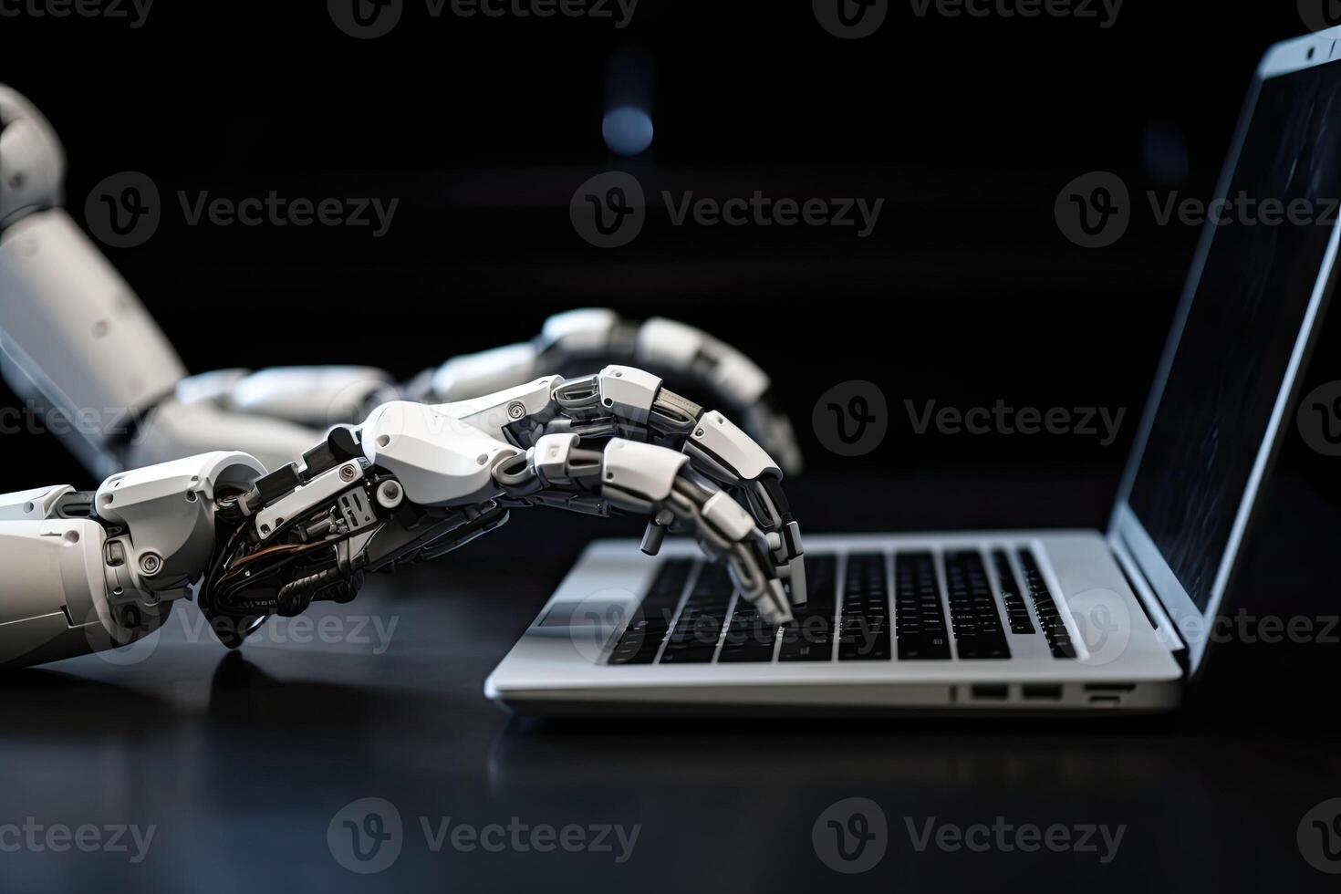 The robotic hand press a keyboard on a laptop. Chatbot robotic concept. photo
