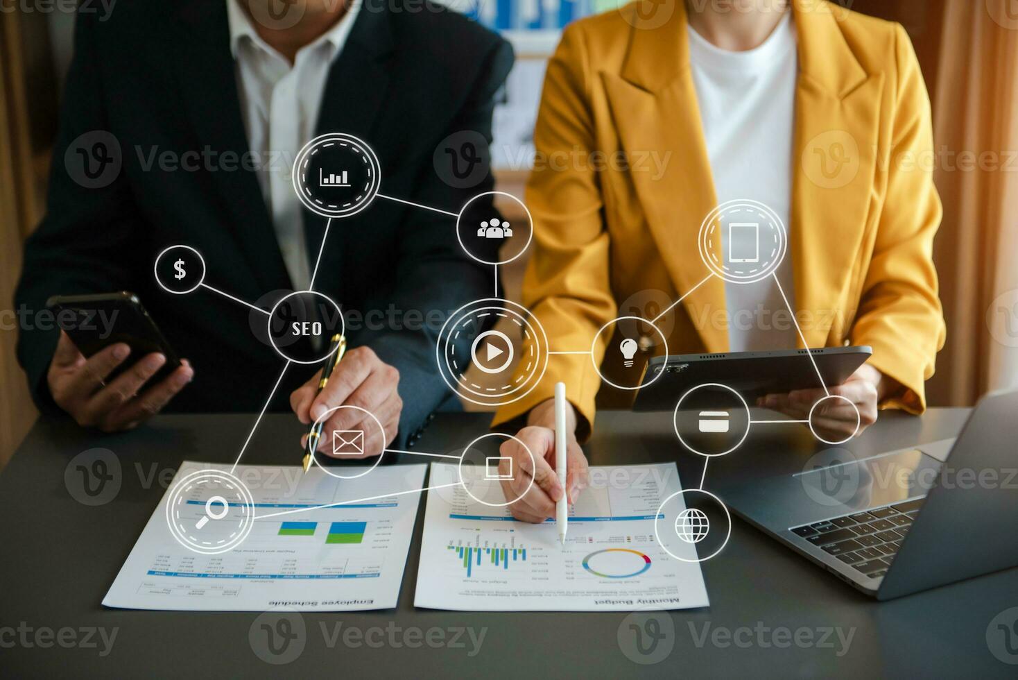 Co working team meeting concept,business with smart phone and laptop and digital tablet computer in office with virtual interface icons photo