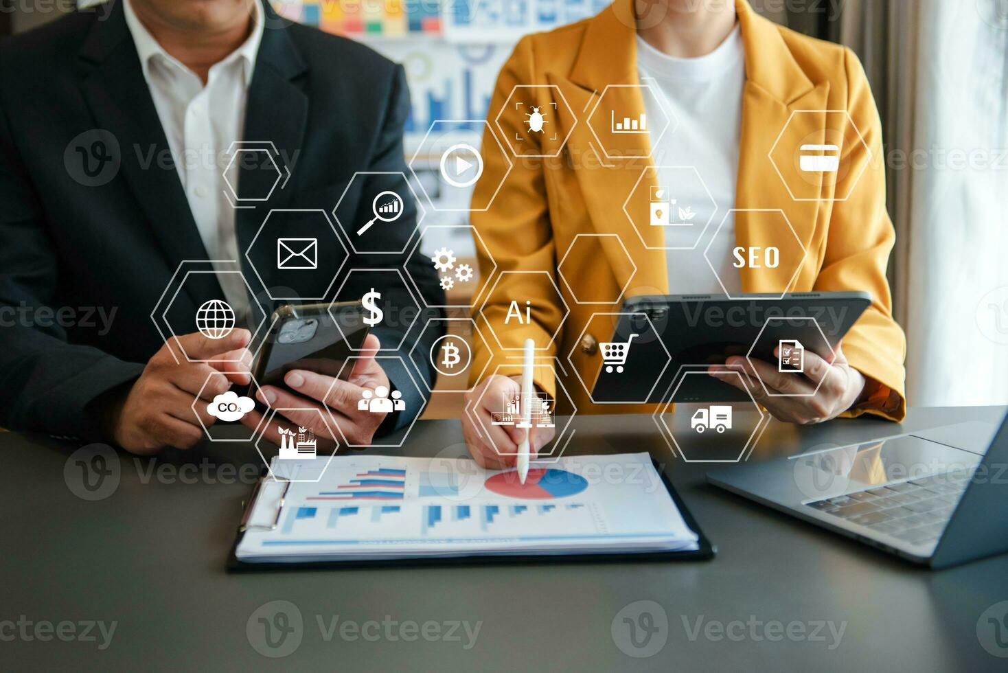 Co working team meeting concept,business with smart phone and laptop and digital tablet computer in office with virtual interface icons photo