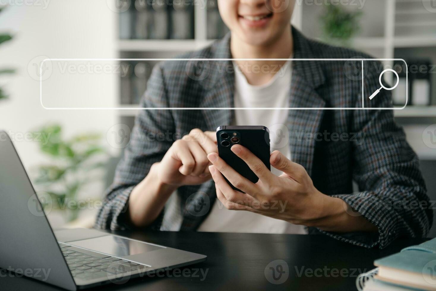Searching Browsing Internet Data Information Networking Concept with blank search bar.man working with mobile phone and laptop computer photo