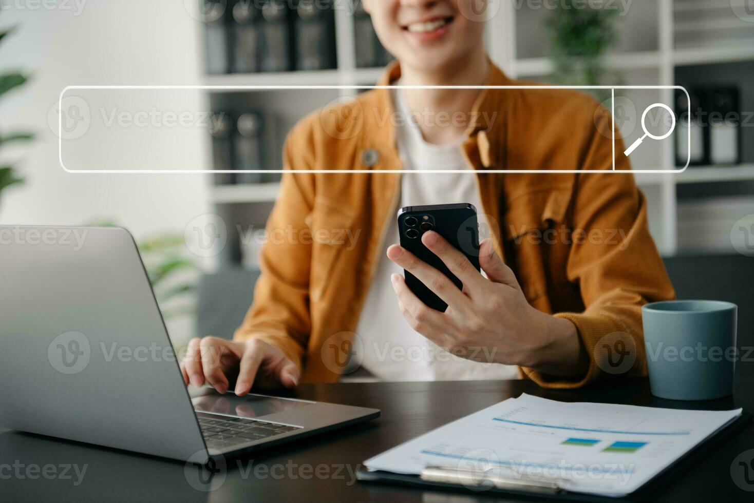 Searching Browsing Internet Data Information Networking Concept with blank search bar.man working with mobile phone and laptop computer photo