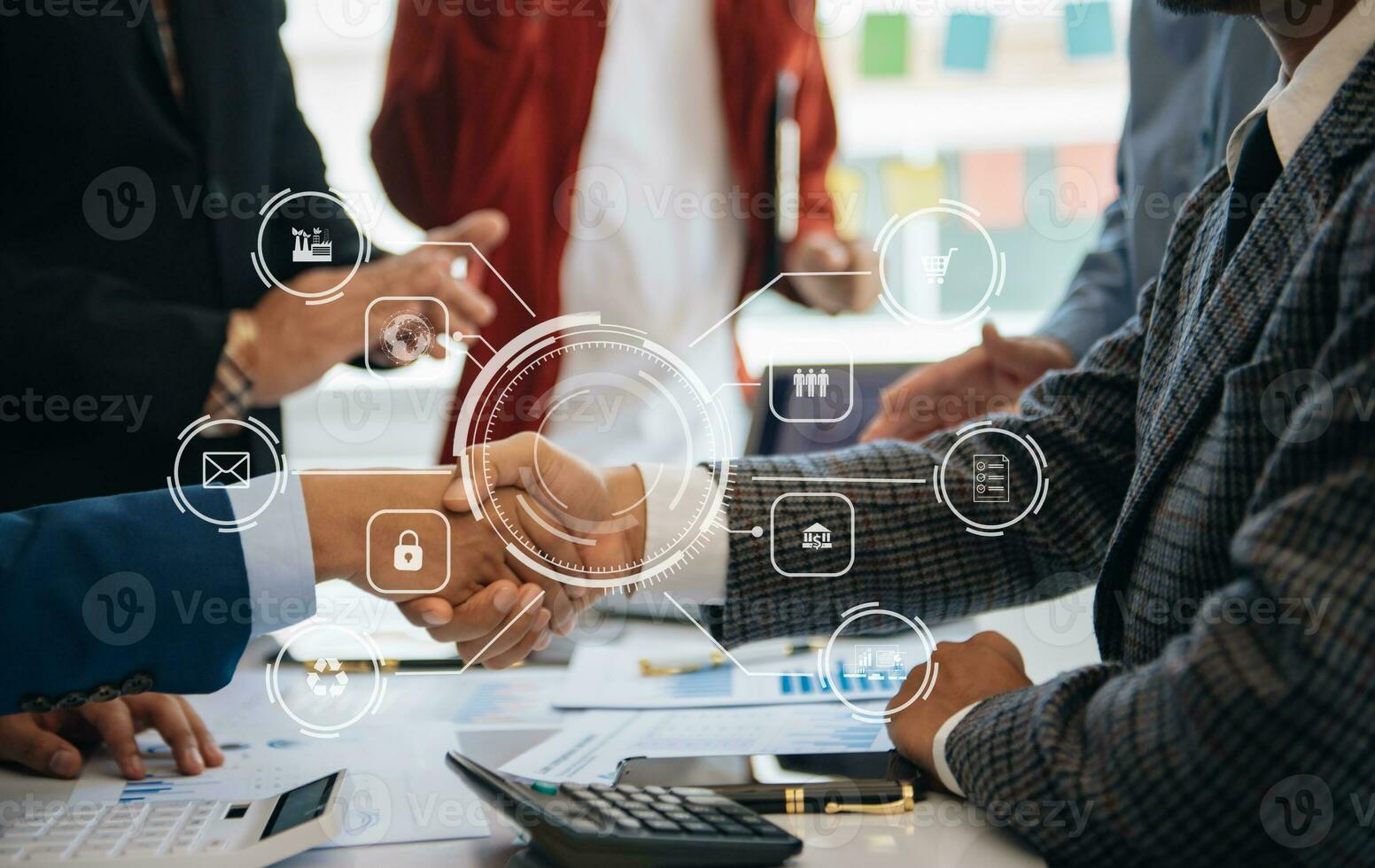 Co working team meeting concept,business with smart phone and laptop and digital tablet computer in office with virtual interface icons photo