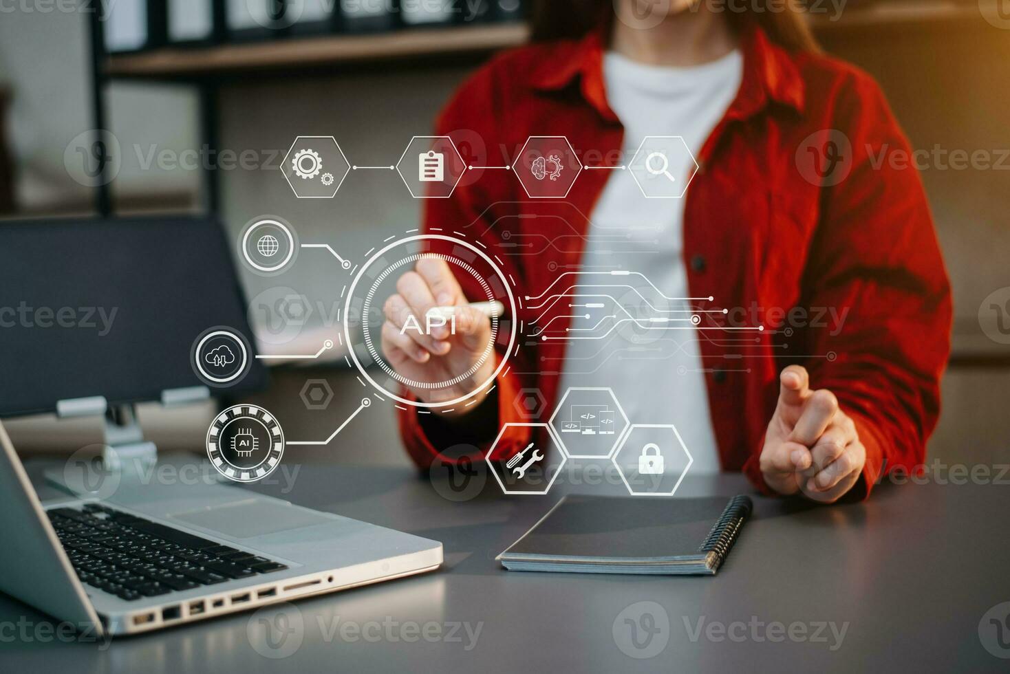 API Application Programming Interface, woman using laptop, tablet and smartphone with virtual screen API icon Software development tool, modern technology concept. photo