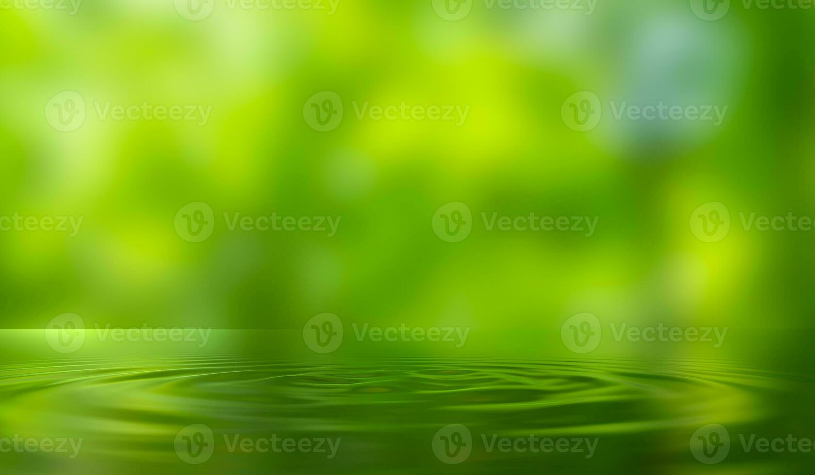 water droplets on green nature background De-focused closeup of mint green transparent clear calm water surface texture with splashes and bubbles. Trendy abstract summer nature background. photo