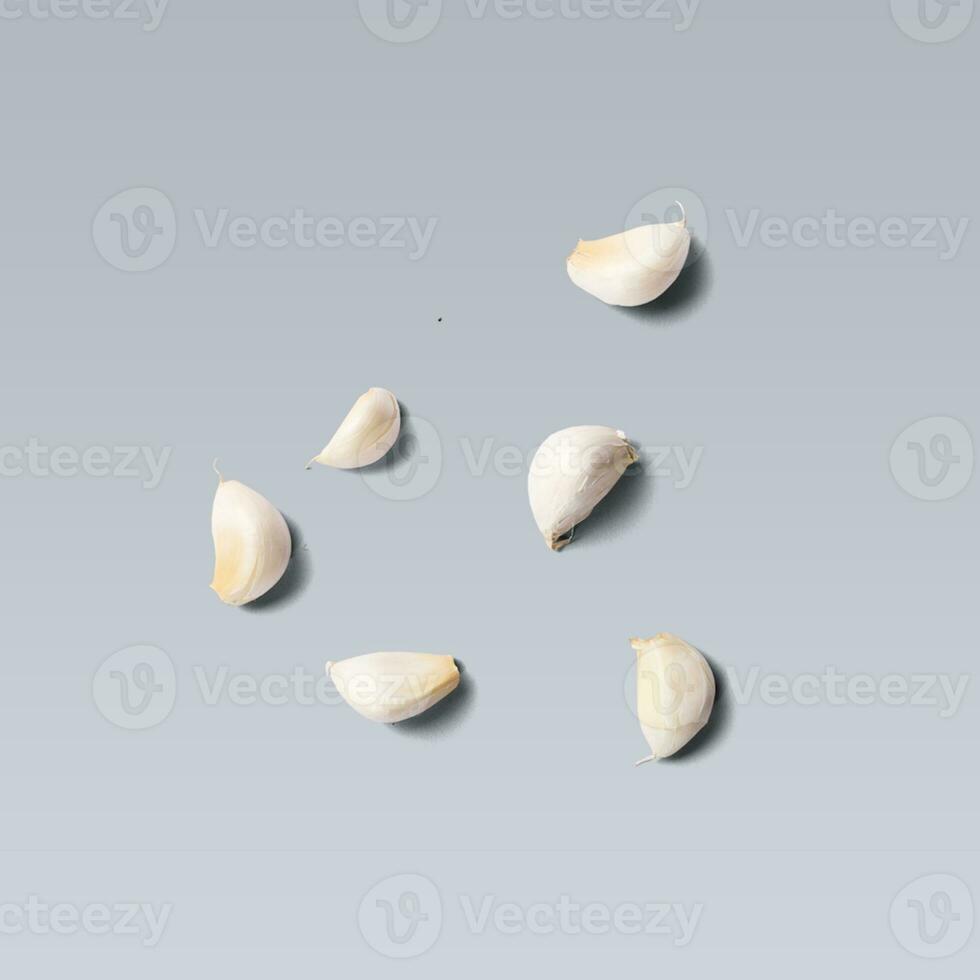 Bulb of white garlic against white background. photo