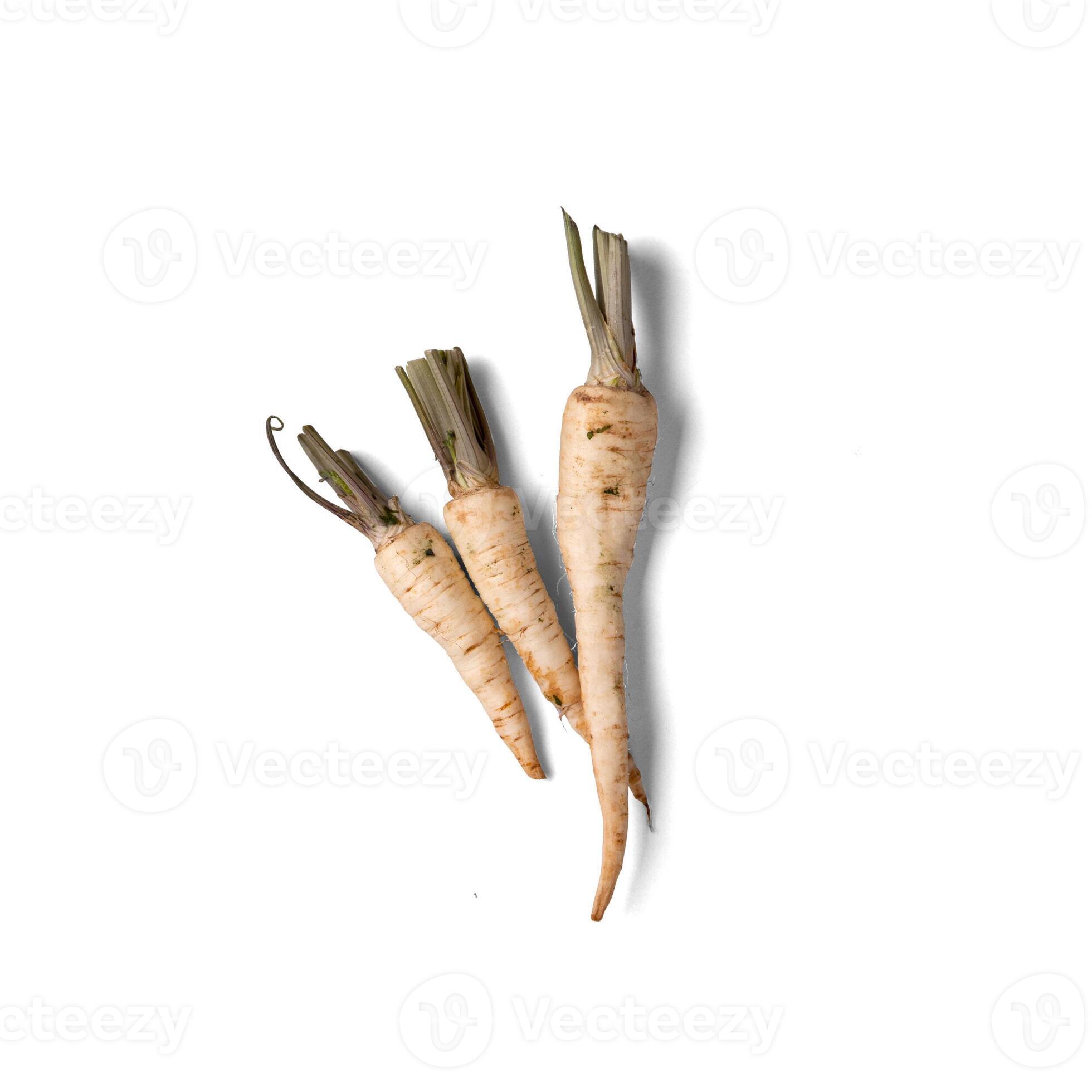 Close up view parsley roots against white background. 26121153 Stock