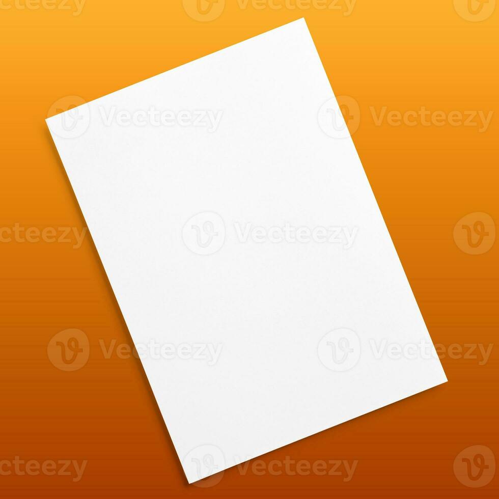 Blank flyer poster isolated on brown to replace your design. photo