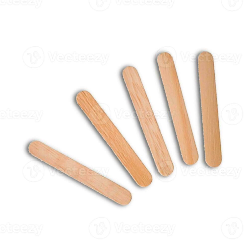 Pile of wooden tongue depressor on blank white for medicine concept. photo