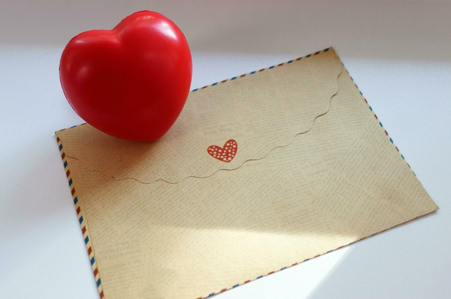 photo envelope with a heart - a romantic declaration of love for the holidays wedding, valentine's day, birthday, mother's day