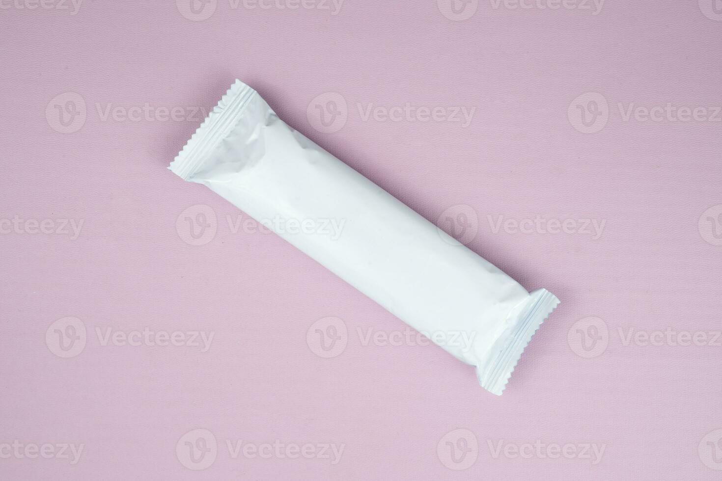 White plastic packaging for chocolate snack mockups photo