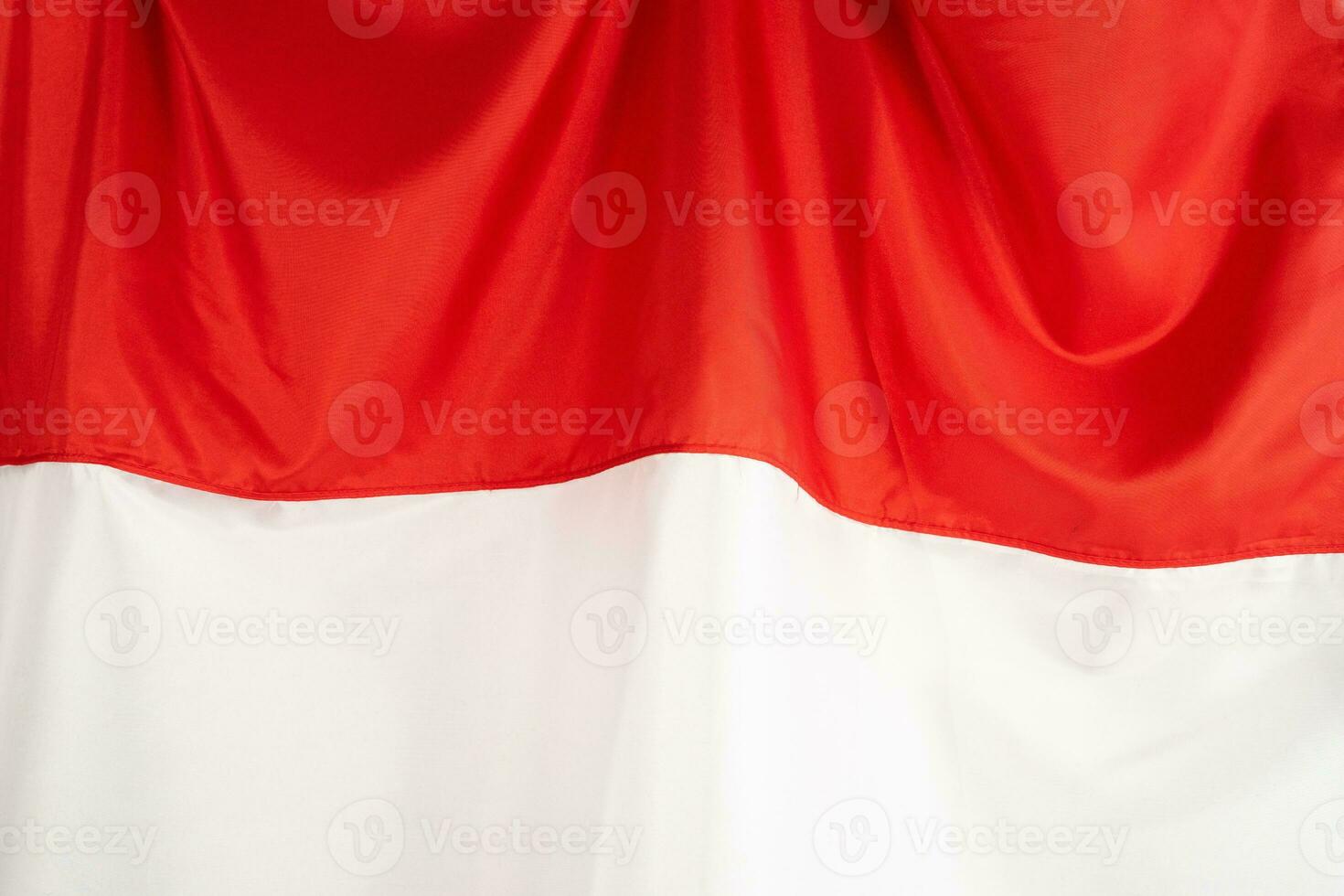 Wavy fabric Indonesia flag texture background photo