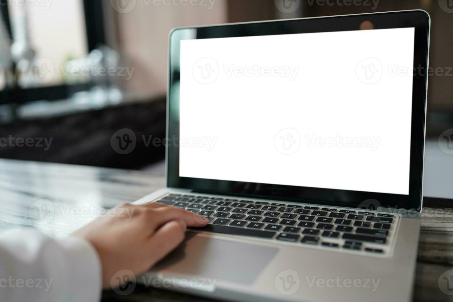 Laptop with Mock up blank screen on table in front of cafe space for text. product display computer laptop montage- technology concept photo