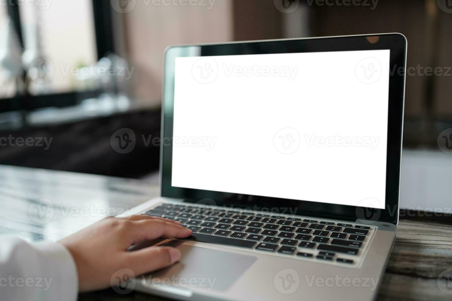Laptop with Mock up blank screen on table in front of cafe space for text. product display computer laptop montage- technology concept photo