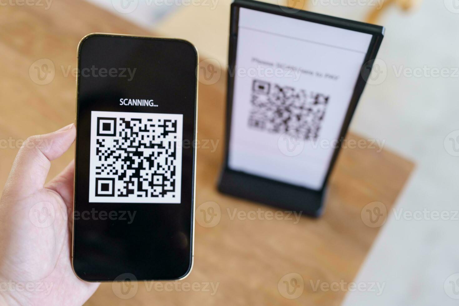 Qr code payment. E wallet. Man scanning tag accepted generate digital pay without money.scanning QR code online shopping cashless payment and verification technology concept. photo