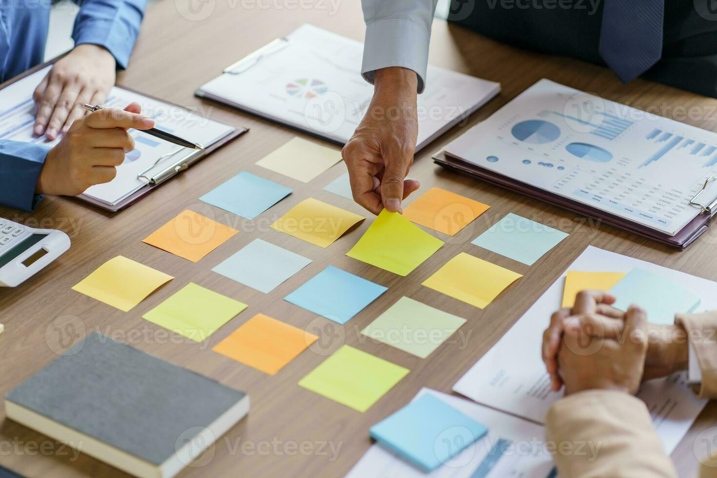 Business People brainstorming Meeting Design Ideas use post it notes to share idea professional investor start up project business brainstorming planning in office photo