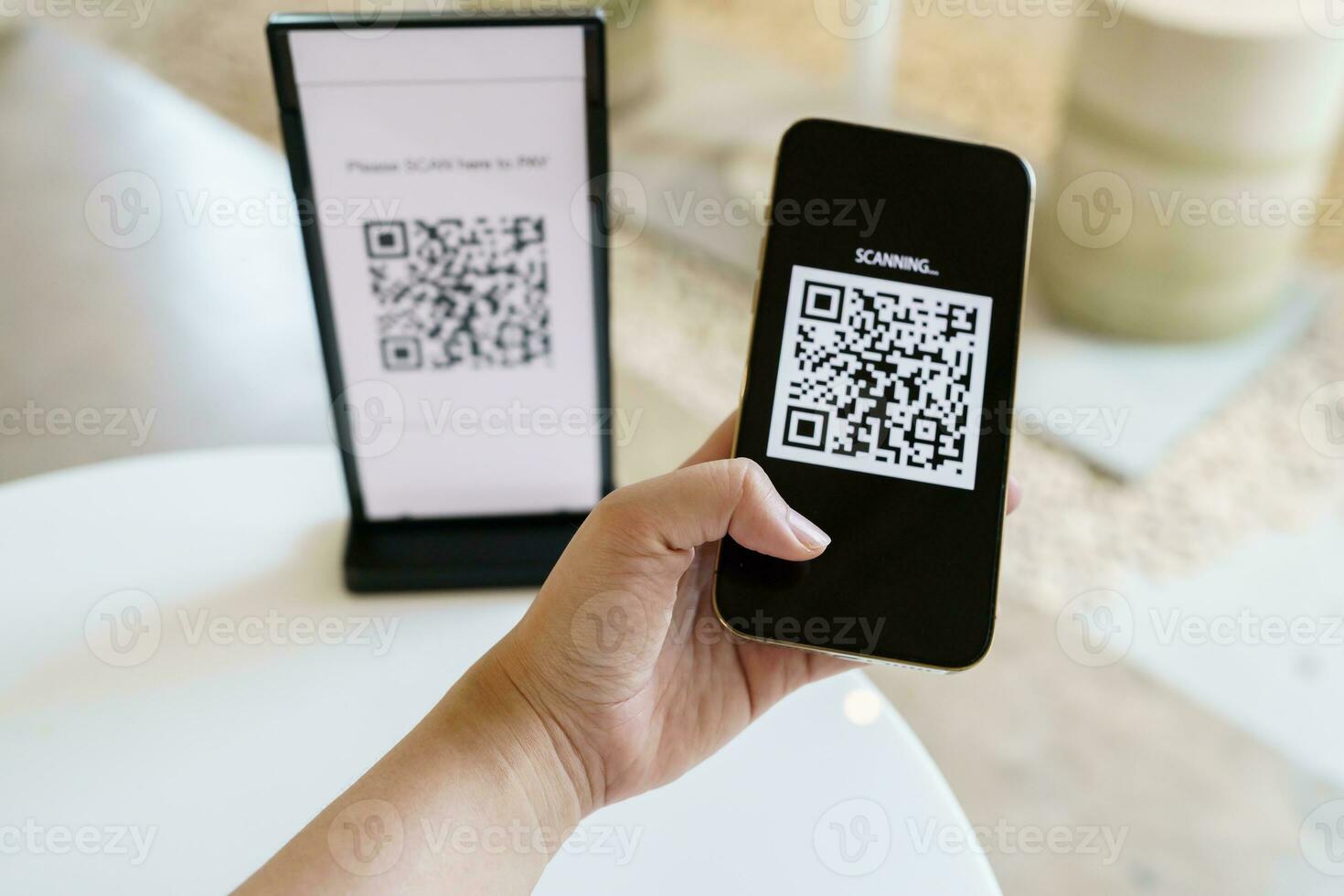 Qr code payment. E wallet. Man scanning tag accepted generate digital pay without money.scanning QR code online shopping cashless payment and verification technology concept. photo