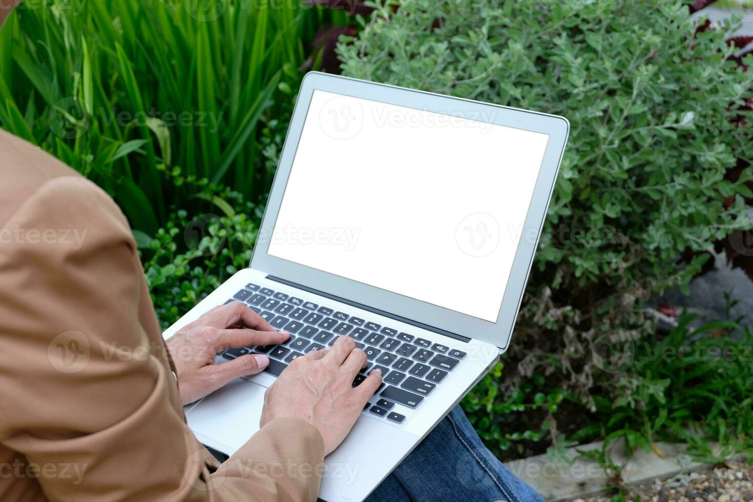 Freelance work concept. Confident busy freelancer in trendy eyewear doing remote job  in workplace photo