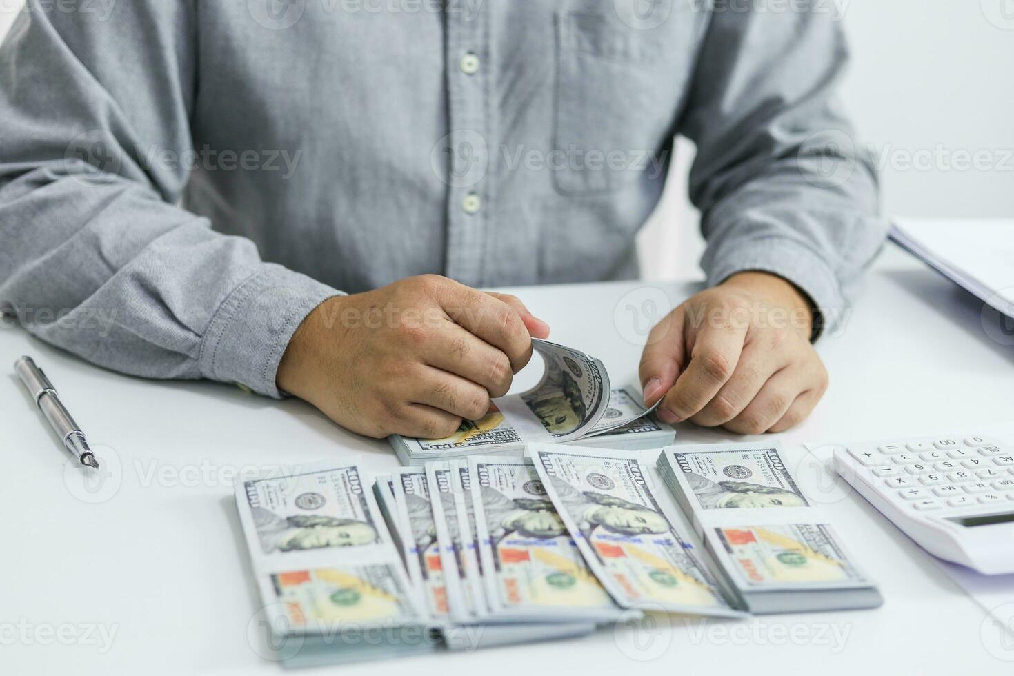 Businessman checking bills. taxes bank account balance and calculating annual financial statements of company. Accounting Audit Concept. photo