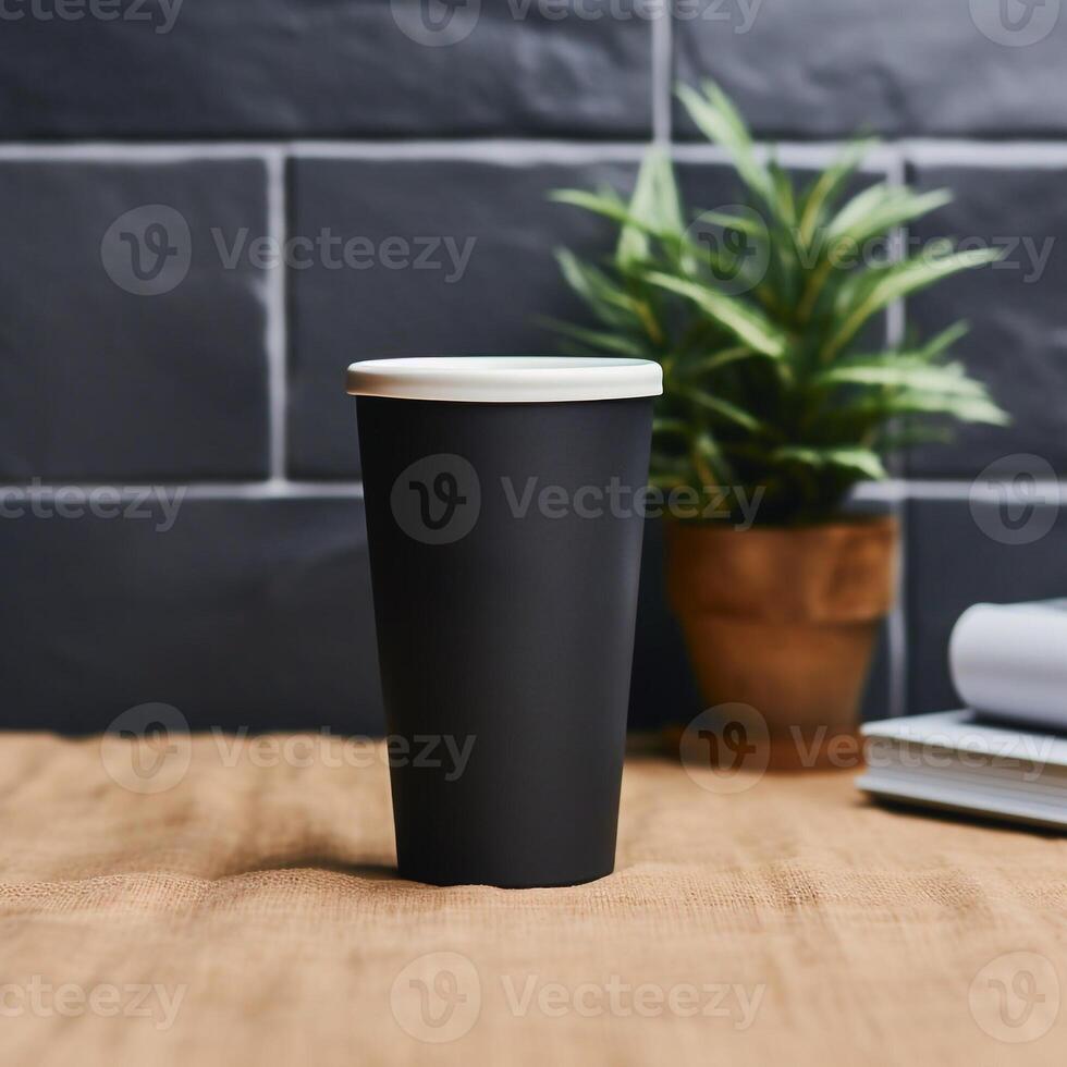 .Black glass on empty table mockup. photo