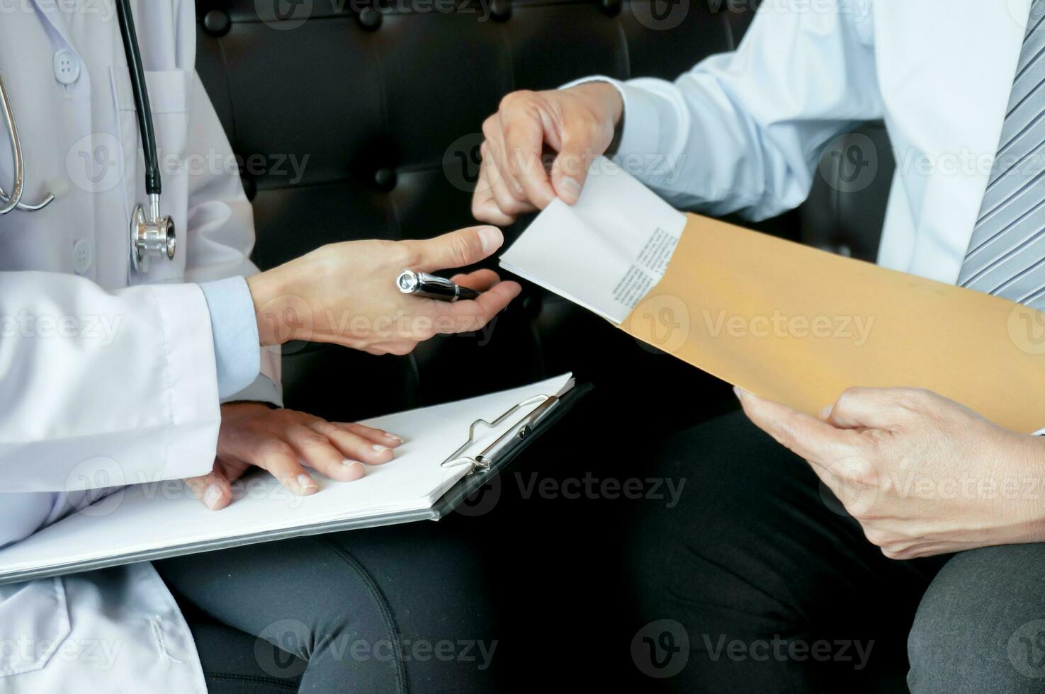 Couple Discussing Problems with Psychiatrist and Relationship Counselor. photo