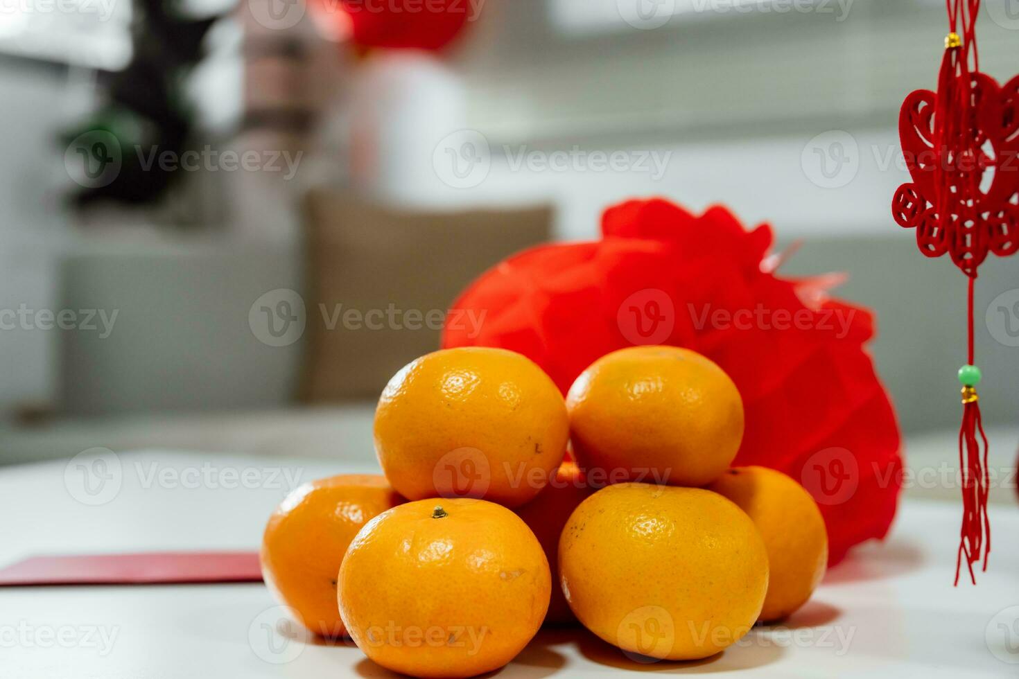 Decorated flat putting traditional pendant to the red Chinese New Year Celebrations for good luck. chinese word means blessing photo