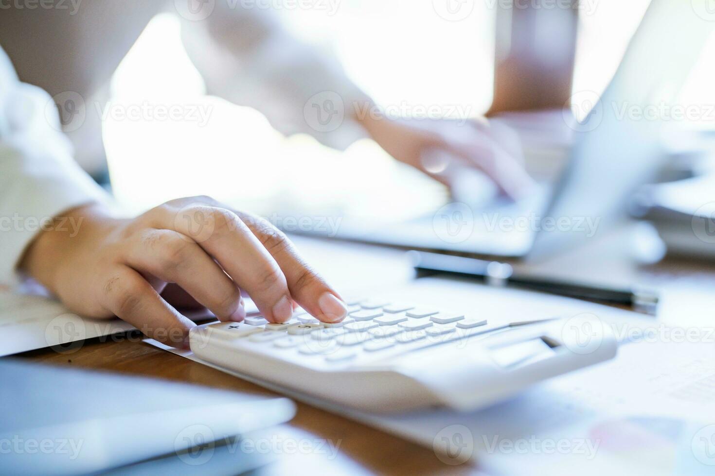 Calculating Cost Economic budget saving and investment concept analyzing investment charts and calculator Accounting Concept photo