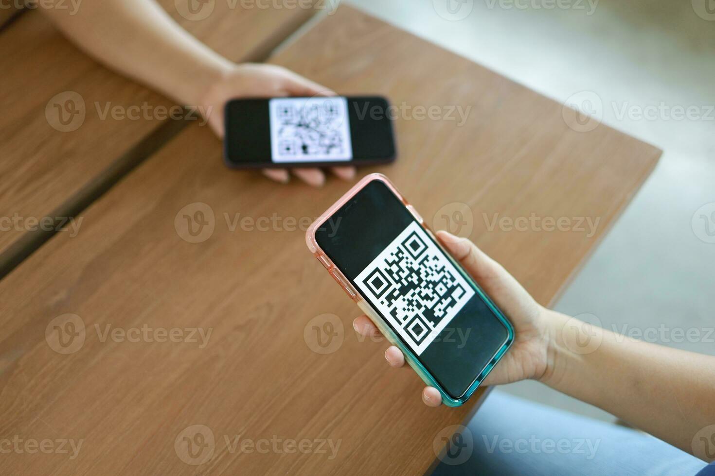 Qr code payment. Woman scanning QR code online shopping cashless technology concept. photo