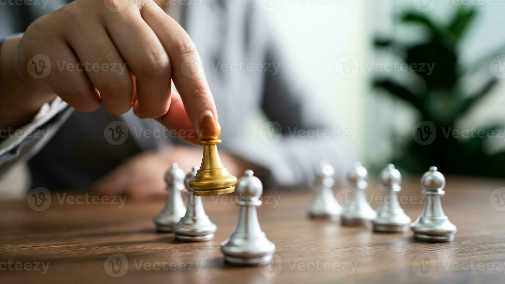 Human resources concept career management with clasped hands planning strategy with chess figures. HR department Search for employees by  inequality in the work collective photo