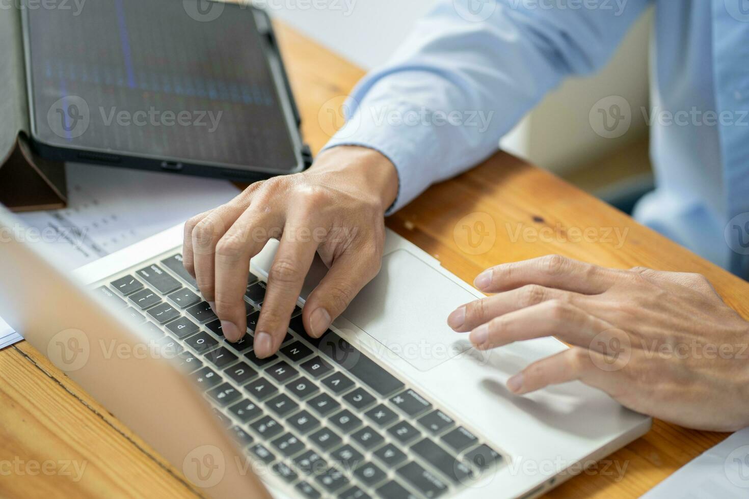 Man work from home. work online on laptop. businessman working online business concept with social distancing laptop online meeting. photo