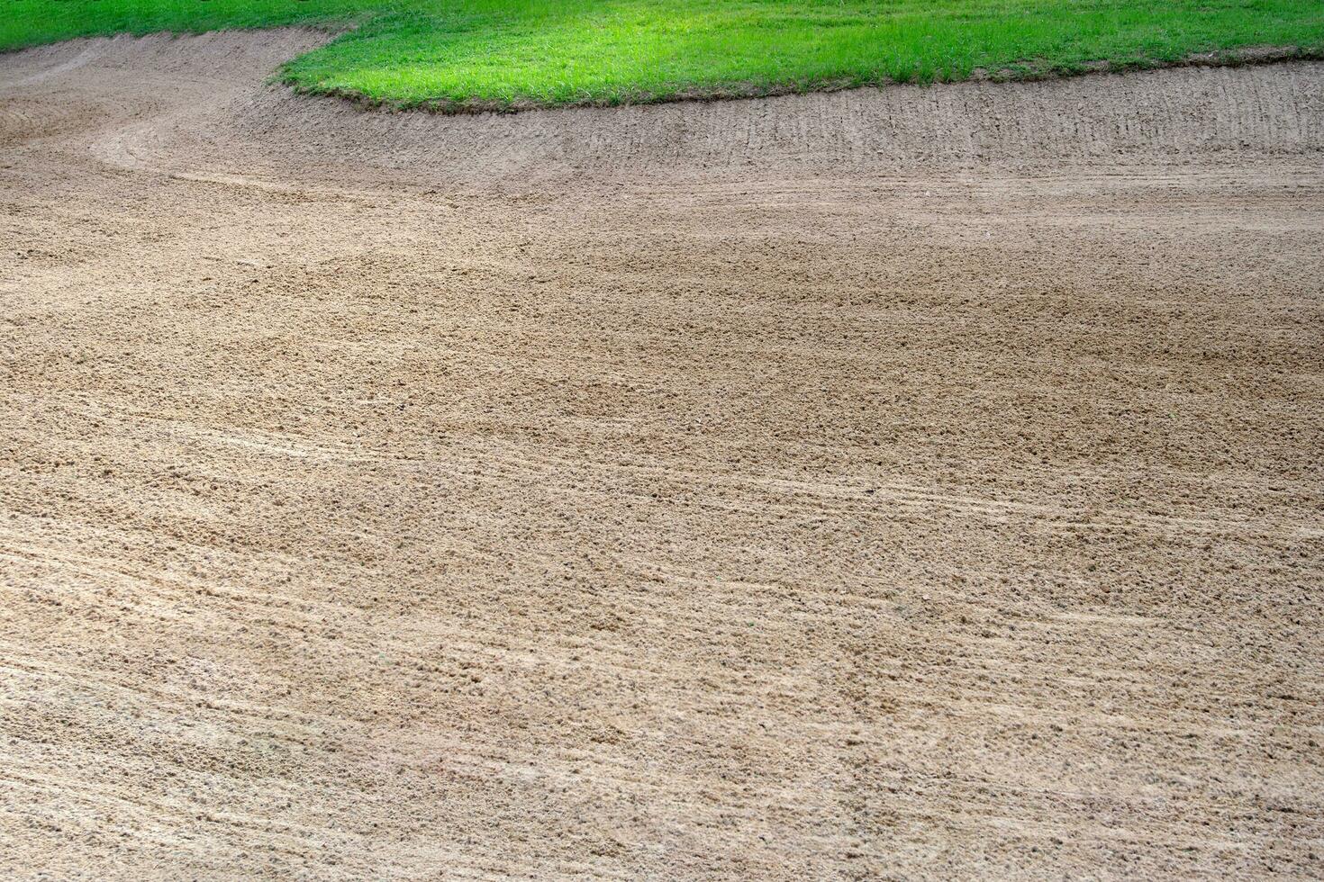 Fondo estético del búnker de arena del campo de golf, utilizado como obstáculos para las competiciones de golf por dificultad y caída del campo por belleza. foto