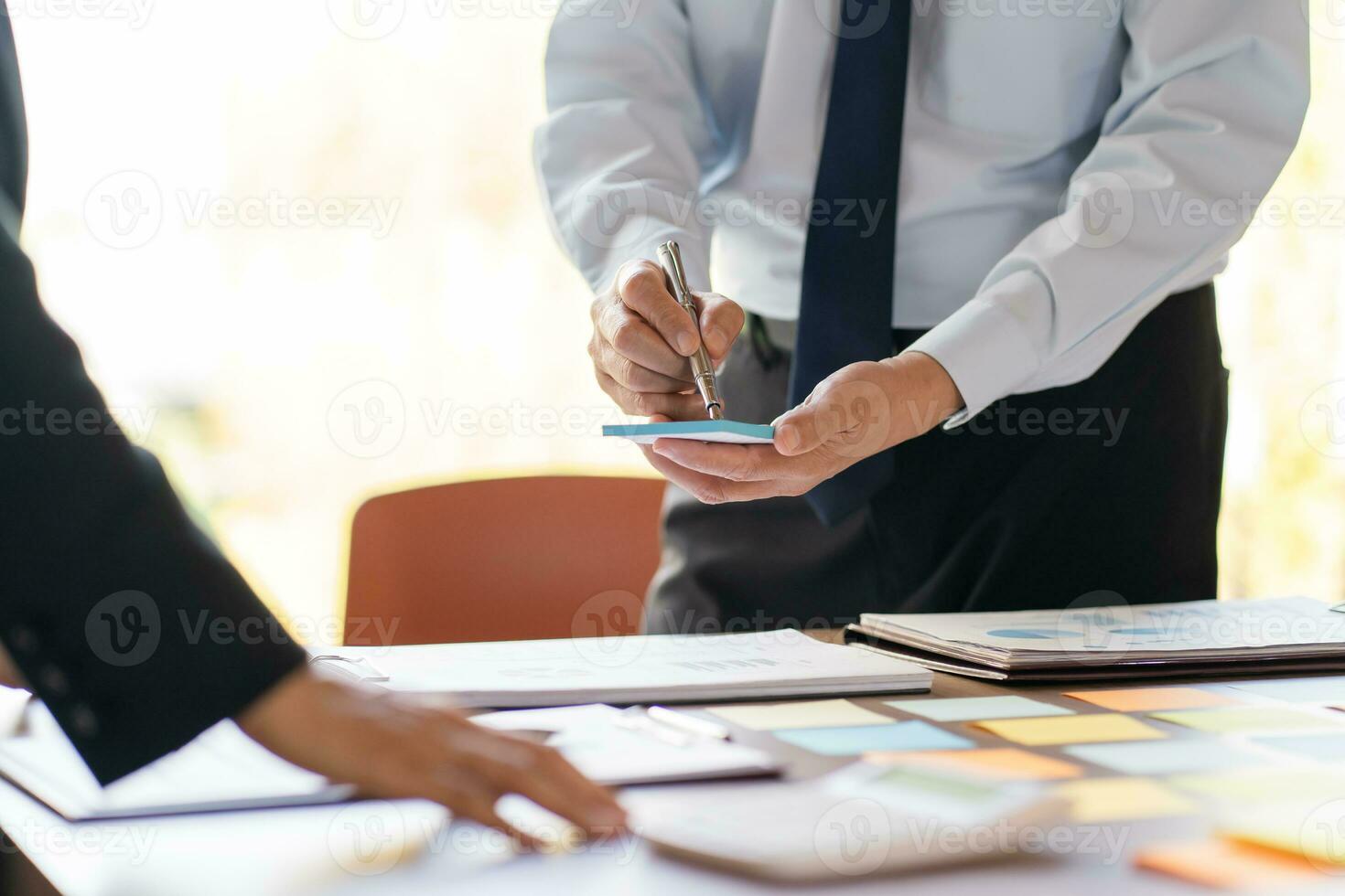 Business People brainstorming Meeting Design Ideas use post it notes to share idea professional investor start up project business brainstorming planning in office photo
