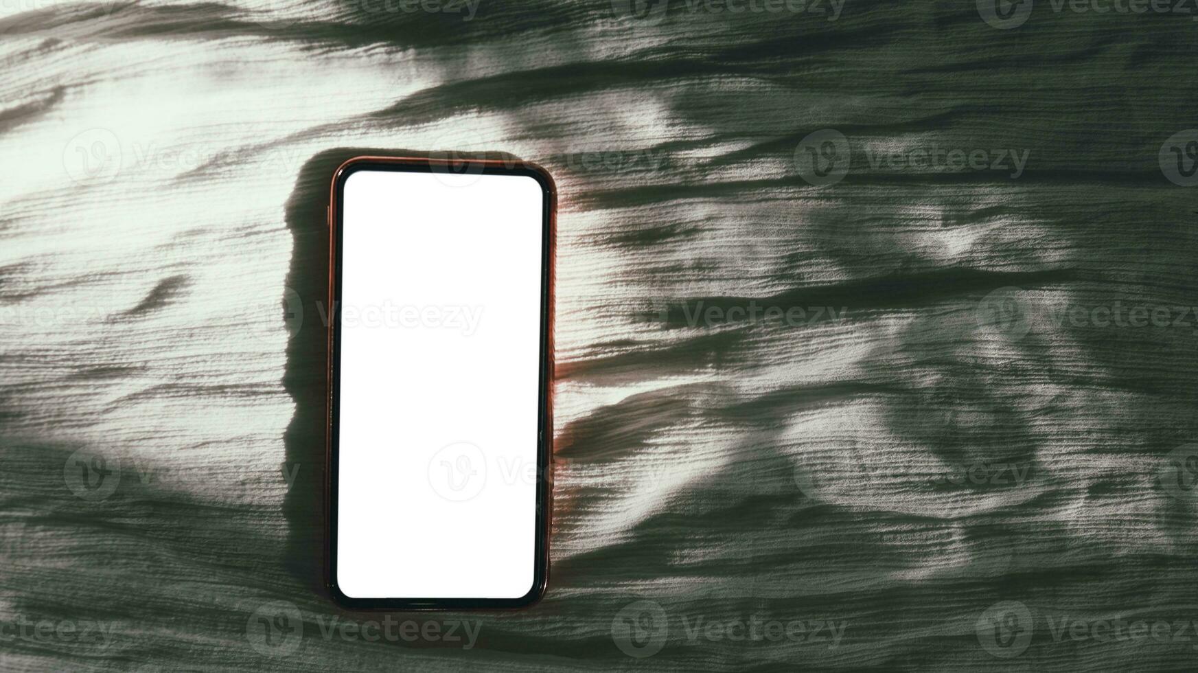 Women's hands holding cell telephone blank copy space screen. smartphone with blank white screen isolated on white background . smart phone with technology concept photo