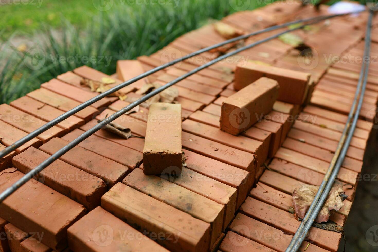 Pallet a red brick building material stack of new red bricks for construction. photo