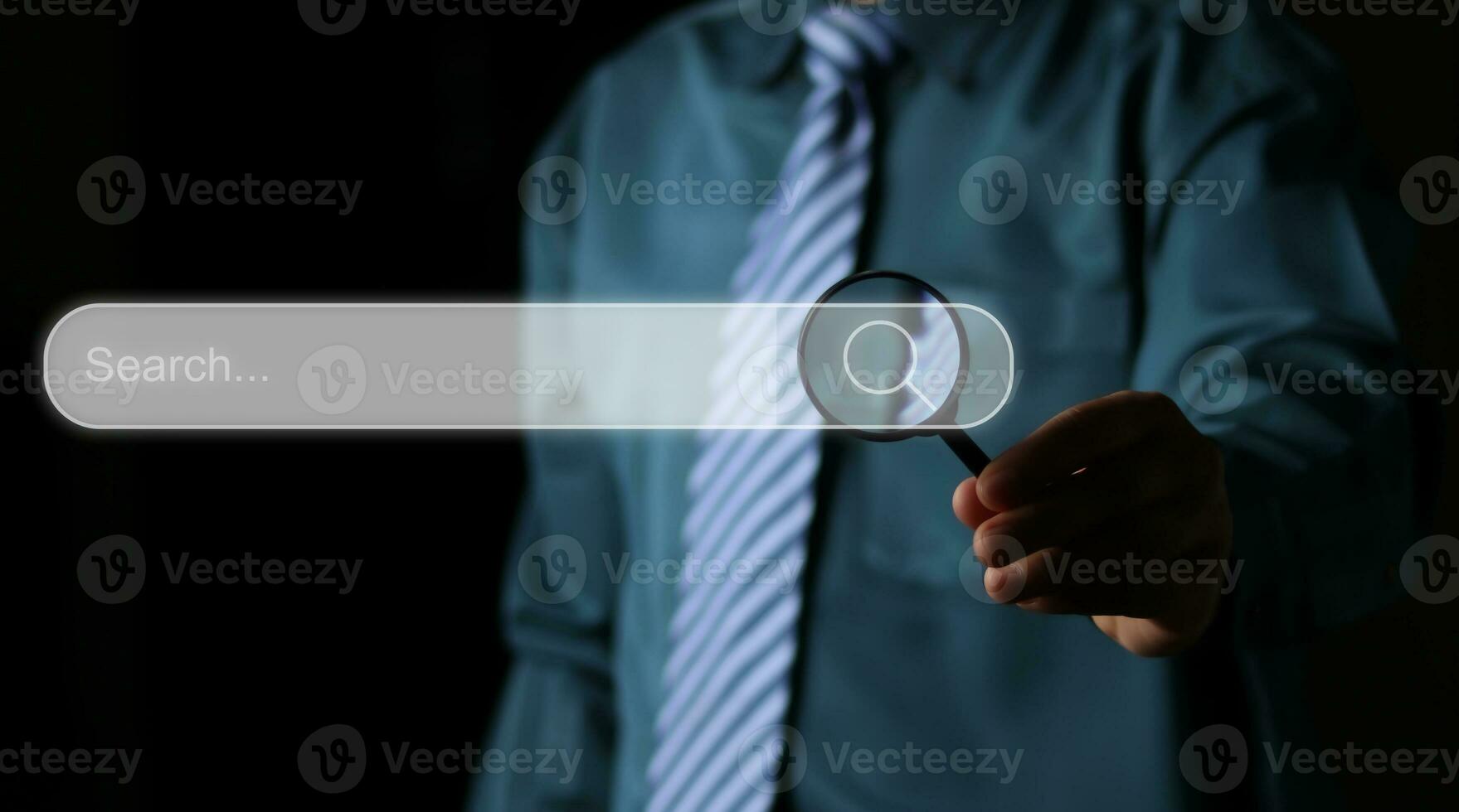 Data Search Technology Search Engine Optimization. man hand holding magnifying glass to Searching for information. Using Search Console with your website. photo