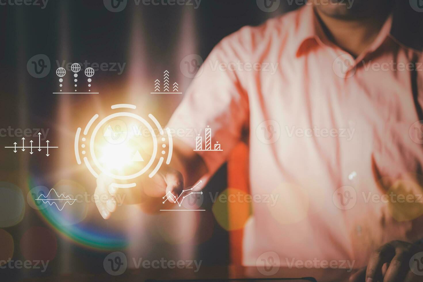 Businessman on blurred background using tech devices and icons thin line interface photo