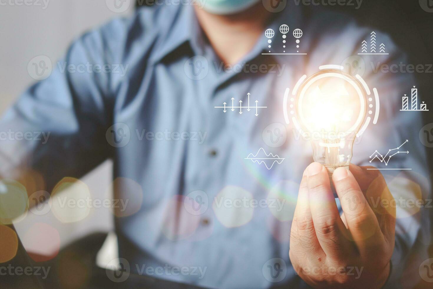 Businessman Hand holding Light bulb Global Internet connection. Business global internet connection application technology and digital marketing, Financial and banking, Digital link tech, big data. photo
