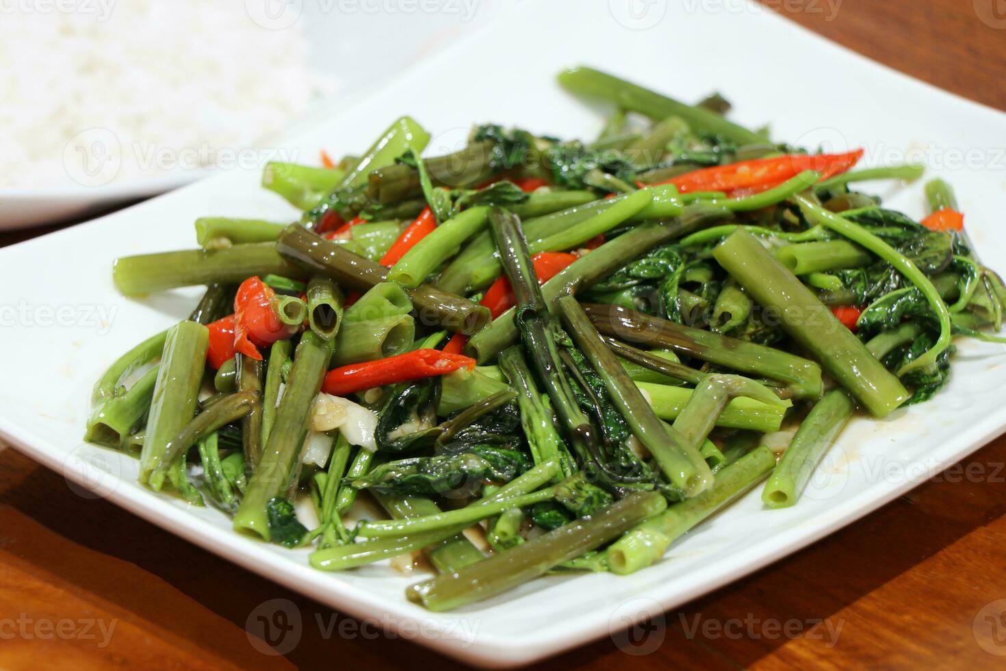 Stir-Fried Chinese Morning Glory or Water Spinach - Asian food style photo