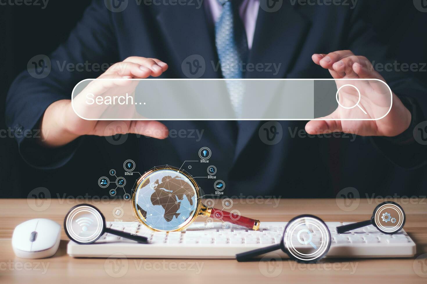 Data Search Technology Search Engine Optimization. Businessman holding a search bar with a magnifying glass and a computer on his desk. Using Search Console with your website. photo