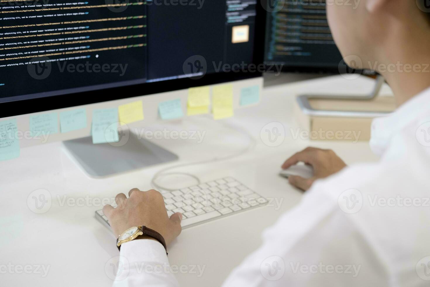 Programmer is coding and programming software photo