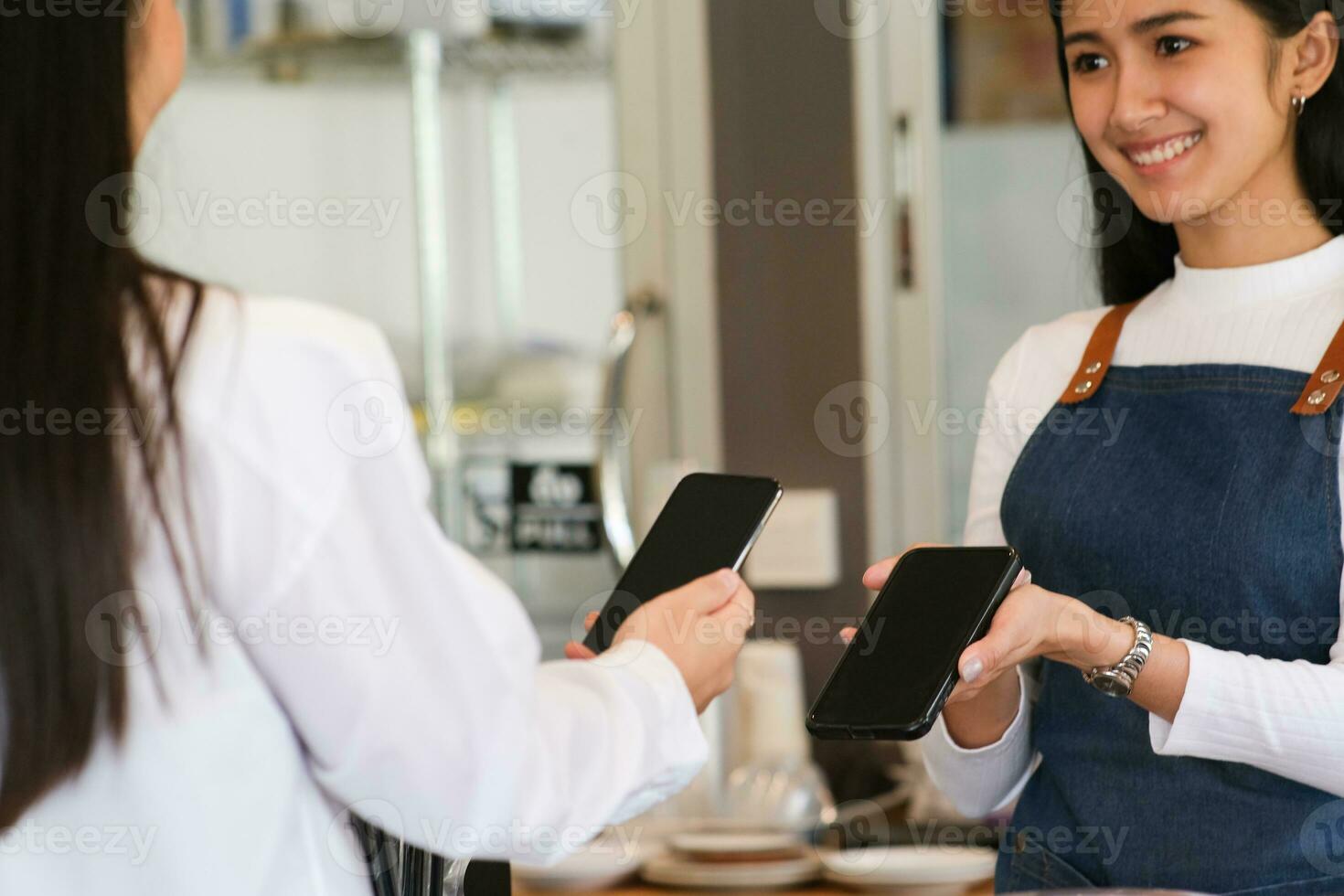 Customer making payment using NFS technology photo