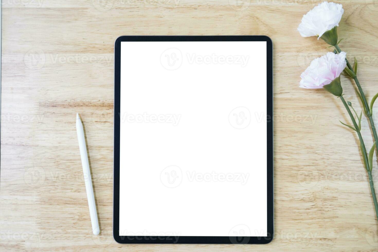 Digital tablet mockup on office working table photo