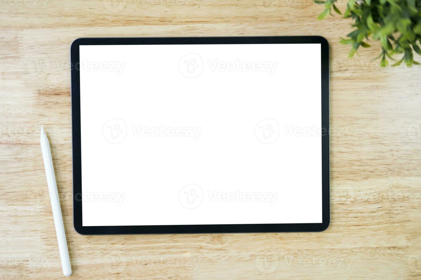 Digital tablet mockup on office working table photo