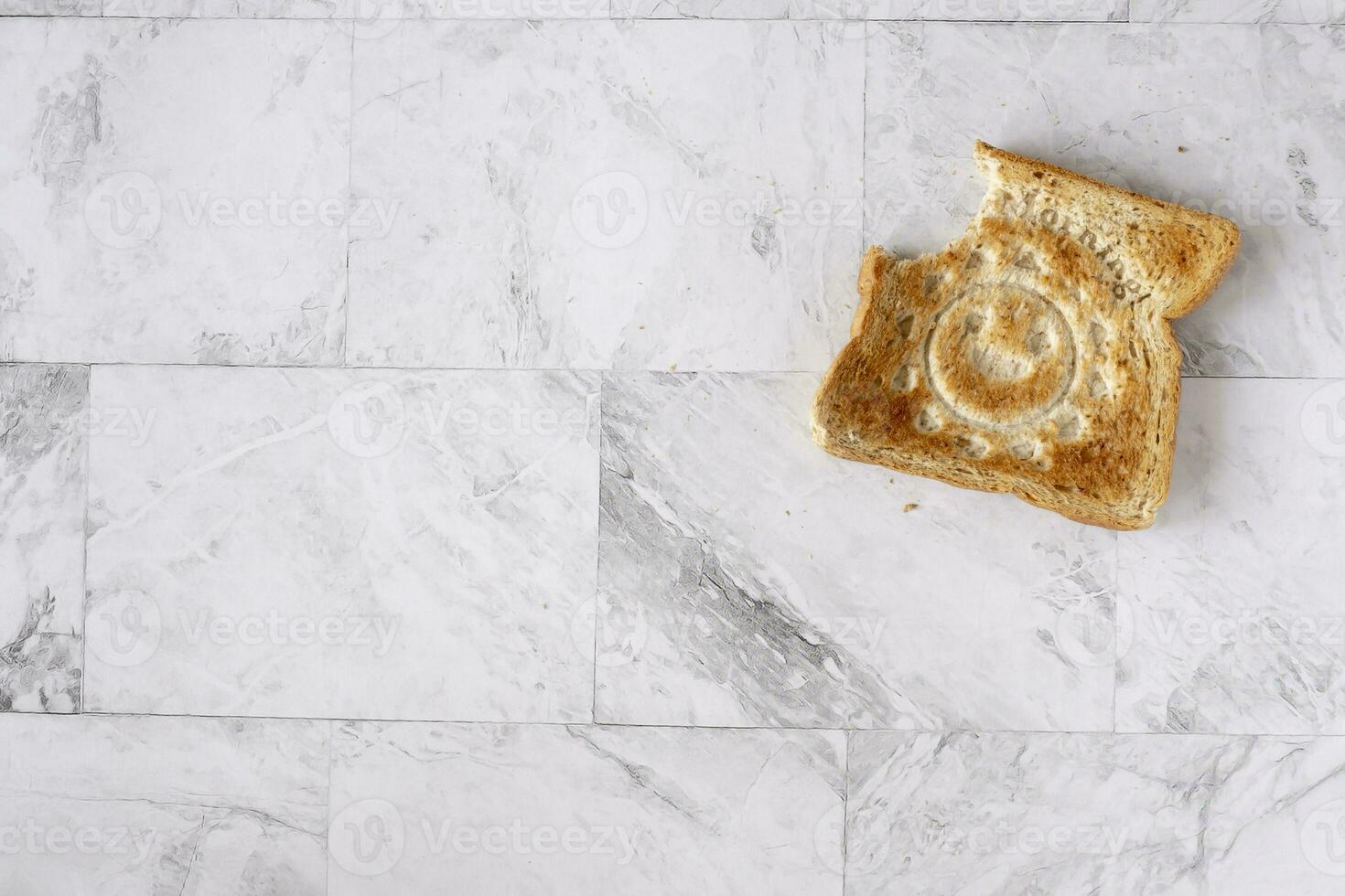 Topview flat lay of working table with toast bread. photo