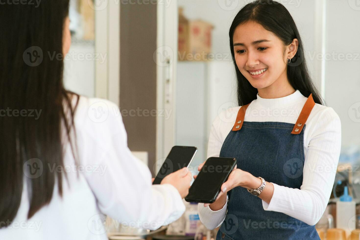 Customer making payment using NFS technology photo