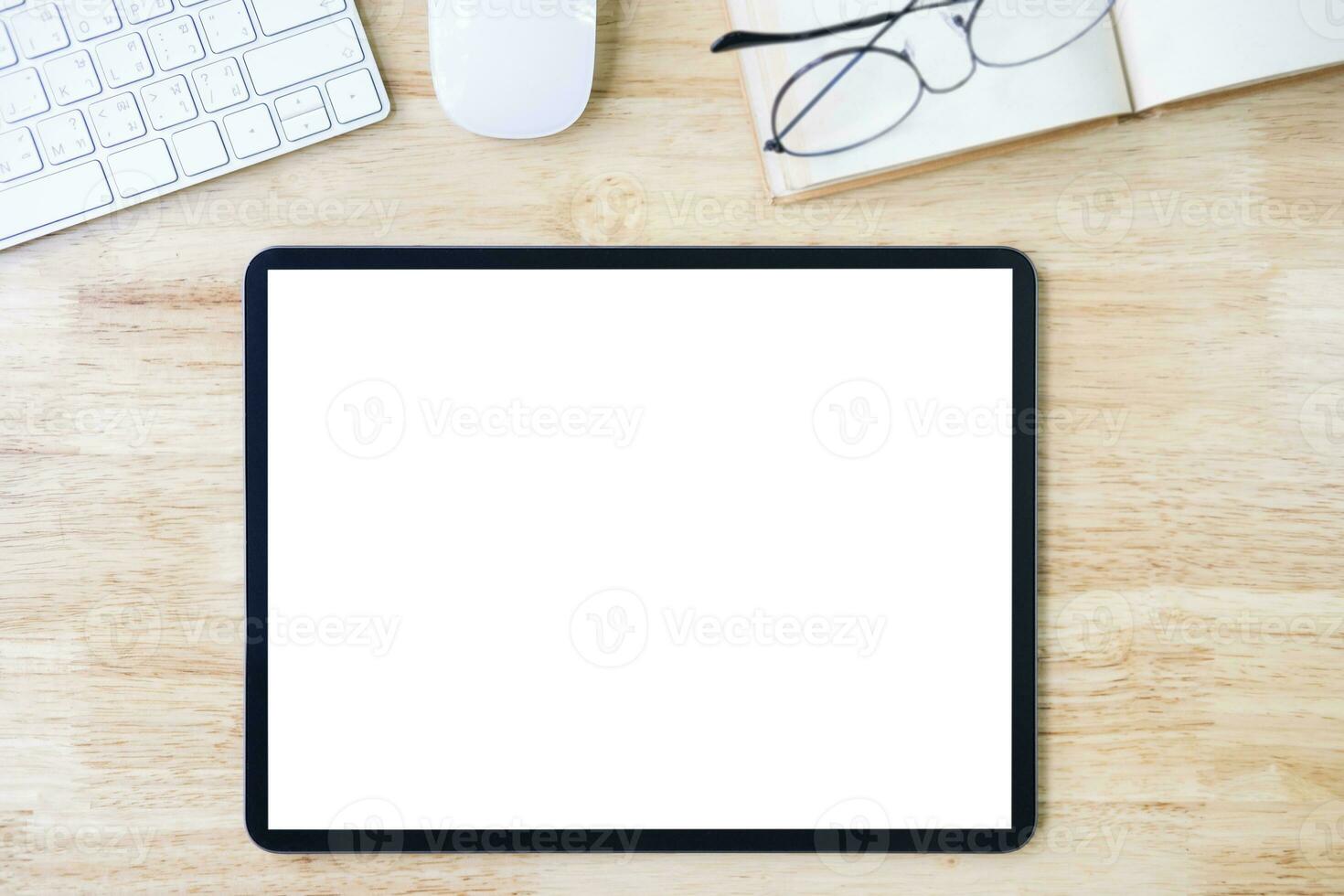 Digital tablet mockup on office working table photo