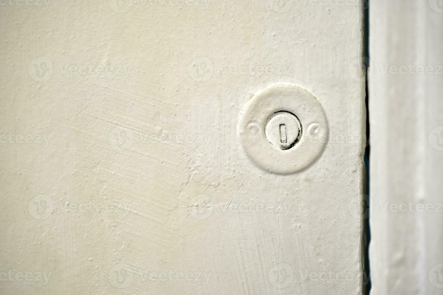 Keyhole close-up. The lock on the door. photo