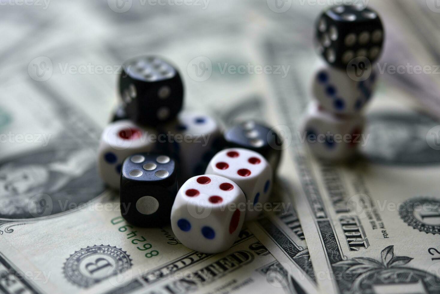 Dollar bills and dice. Financial games. Speculation. photo