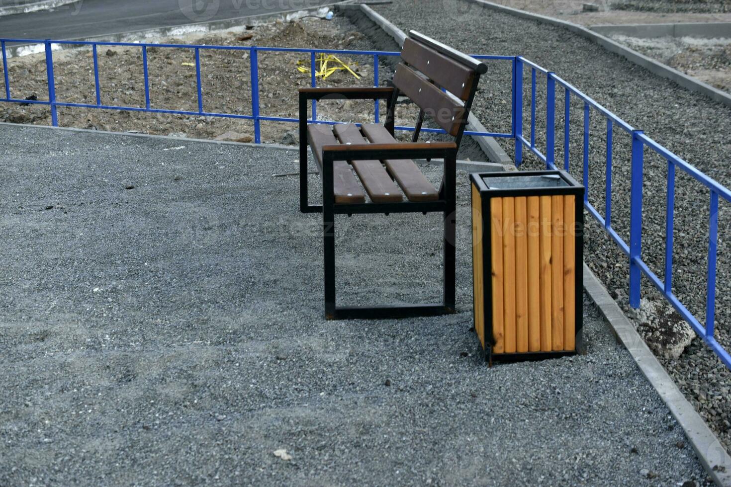 Benches and trash cans in the recreation park. Places to stay in the city. photo