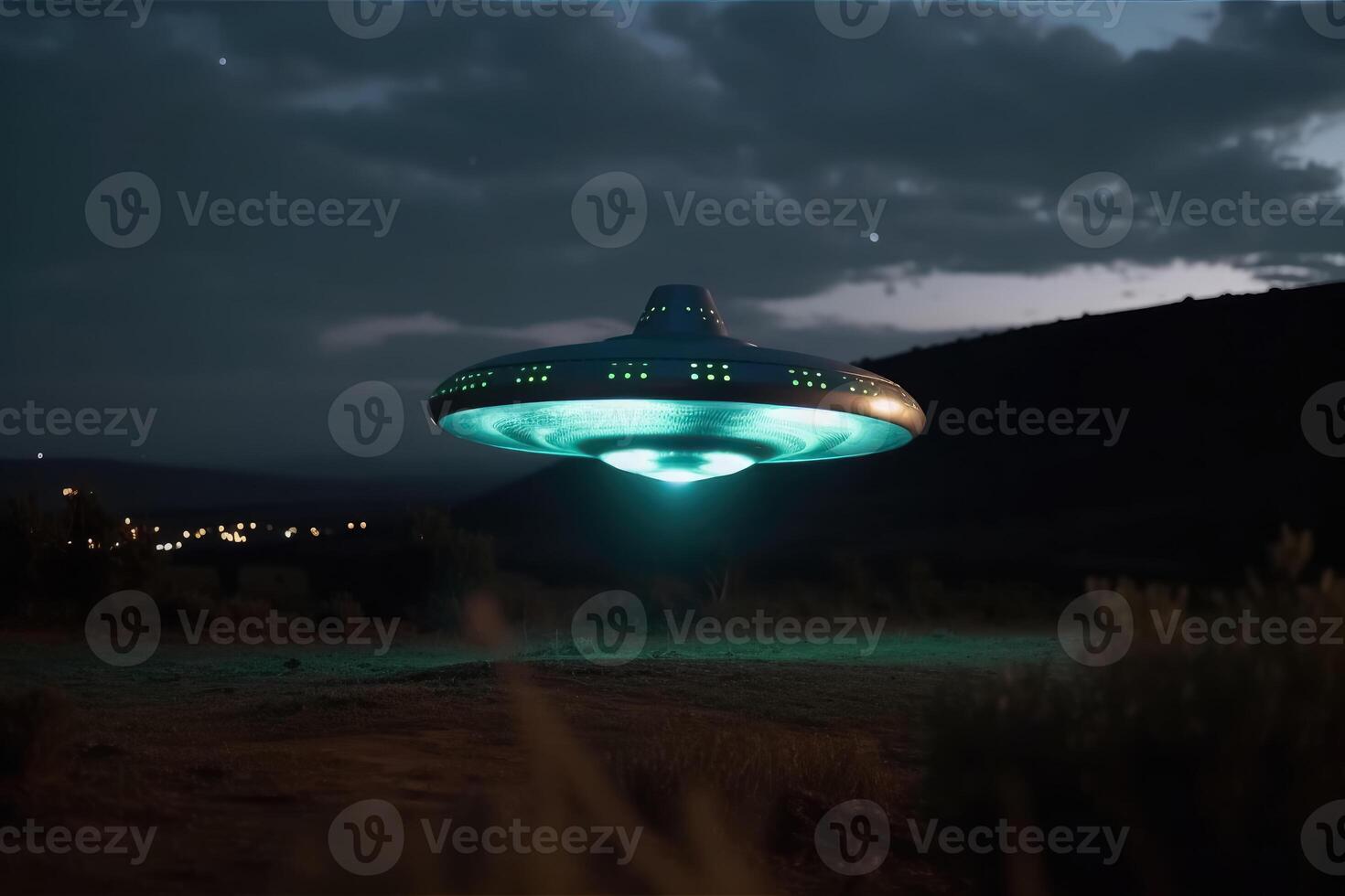 A close up view of a UFO with a spotlight pointed at the bottom of the landscape created with technology. photo